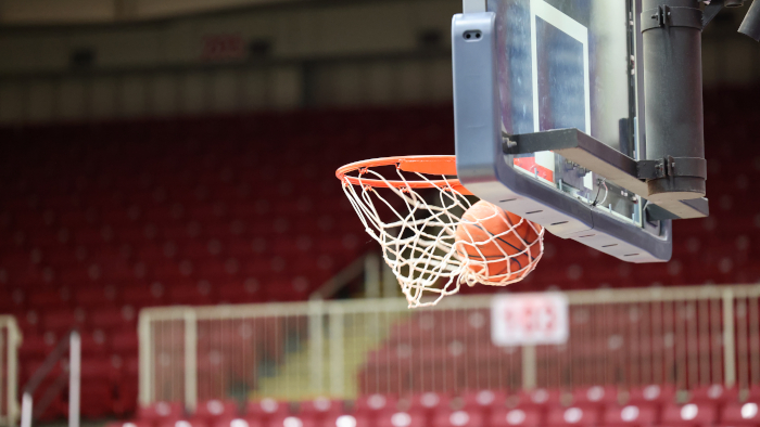 basketball going through the hoop into the net